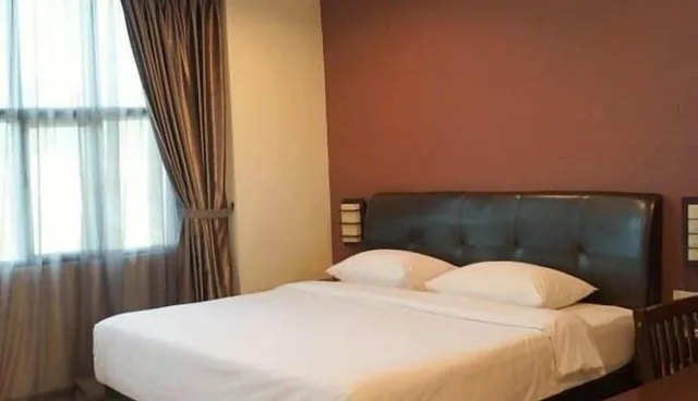 غرفة ديلوكس بسرير كينج، Capital O Rail Hotel 2/2