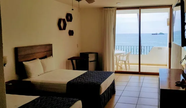 غرفة بريميوم بسريرين مزدوجين بإطلالة على البحر، Costa Alegre Hotel And Suites 3/4