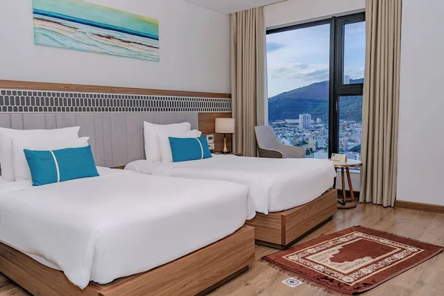 Ocean, Deluxe, Twin Beds، Peninsula Hotel Danang 1/9