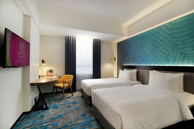 غرفة ديلوكس بسريرين منفصلين للمدخنين، Swiss-Belinn Airport Surabaya 1/4