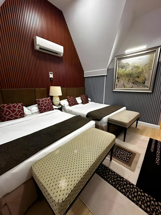 غرفة رباعية بفراش فوتون بإطلالة على الحديقة بشرفة، Shari-La Island Resort 1/1