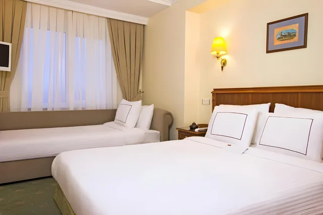غرفة ثلاثية، Orient Express Hotel Spa 1/1
