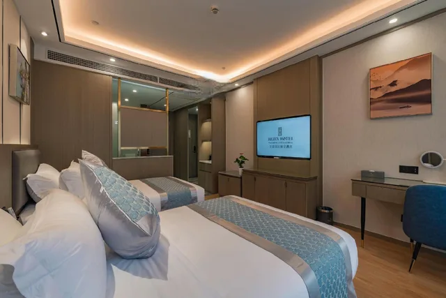 غرفة ديلوكس بسريرين منفصلين، Rezen Hotel Wansheng International 1/1