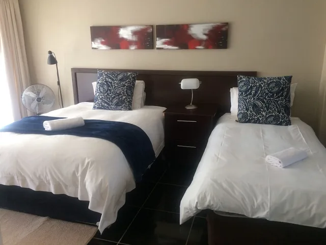 غرفة بسرير مزدوج أو سريرين منفصلين، Mcbest Guest House 1/2