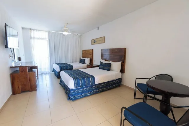غرفة بسريرين مزدوجين بإطلالة على البحر، Costa Alegre Hotel And Suites 3/7