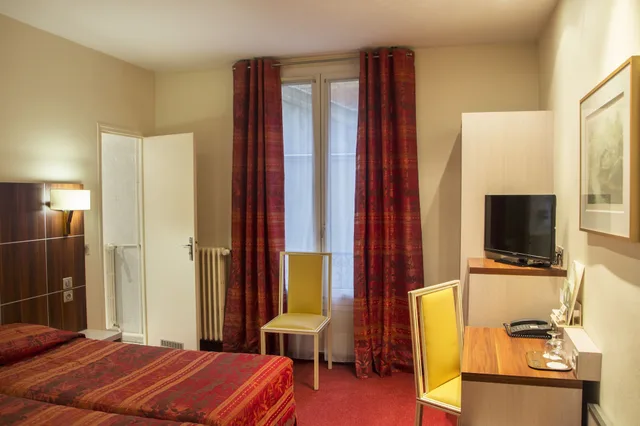 غرفة تنفيذية بسريرين منفصلين، HOTEL TERMINUS MONTPARNASSE 3/10