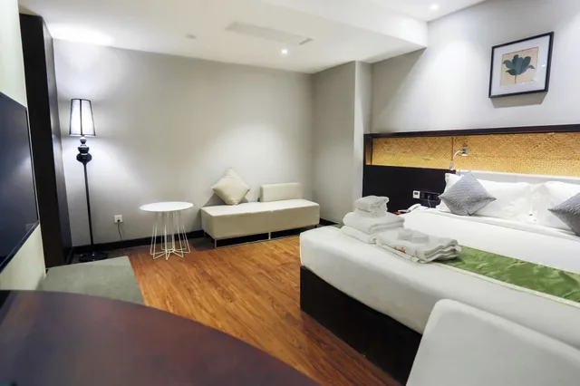 جناح جونيور بسرير مزدوج بمنطقة جلوس، G Mekong Hotel 2/7