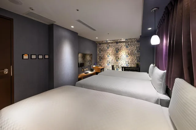 غرفة ديلوكس ثلاثية بثلاثة أسرّة، Le room Hotel Kaifeng Taipei 3/4
