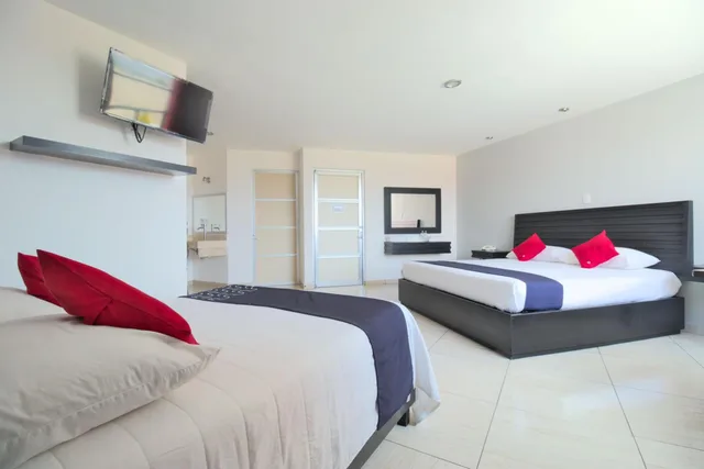 غرفة قياسية بسريرين، Capital O Hotel Euro Confort Pachuca 1/7