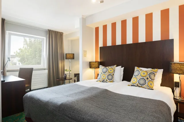 غرفة كلاسيكية بسرير كوين مع أريكة، Profilhotels Garden 3/6