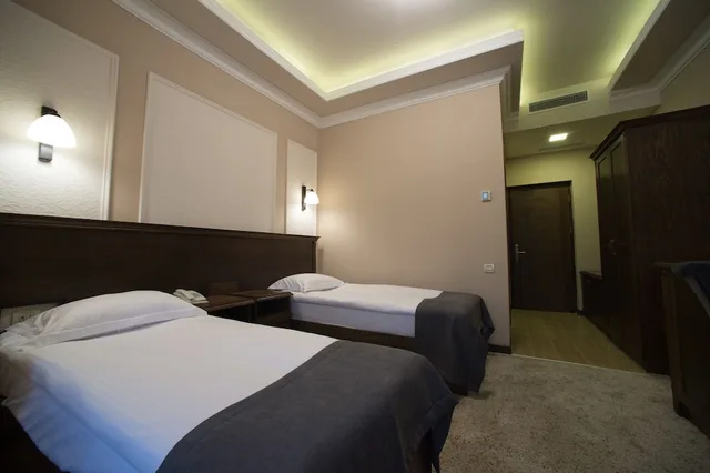 غرفة ديلوكس بسرير كوين بإطلالة على الحديقة، Boulevard Hotel 1/3