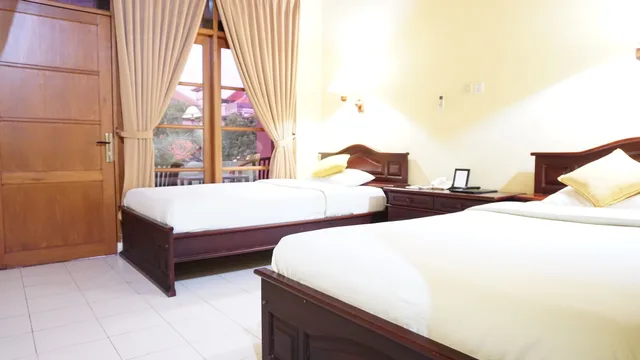 غرفة ديلوكس بسريرين منفصلين، Masainn Hotel Kuta 2/5