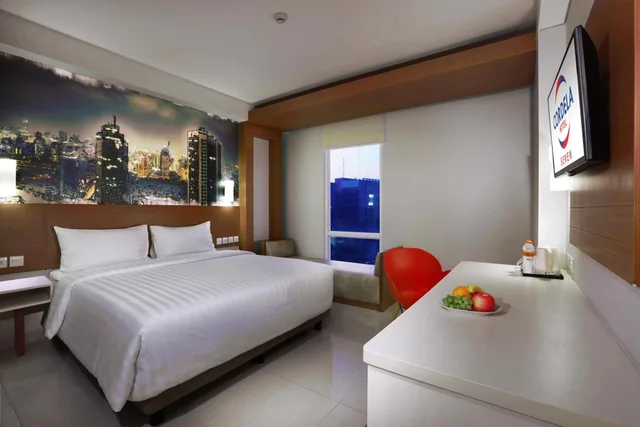 غرفة بزنس ديلوكس بسرير كينج، Cordela Hotel Senen 1/1