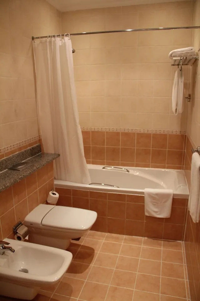جناح ديلوكس بسرير كينج، Villaggio Hotel and Resort Abu Dhabi 8/8