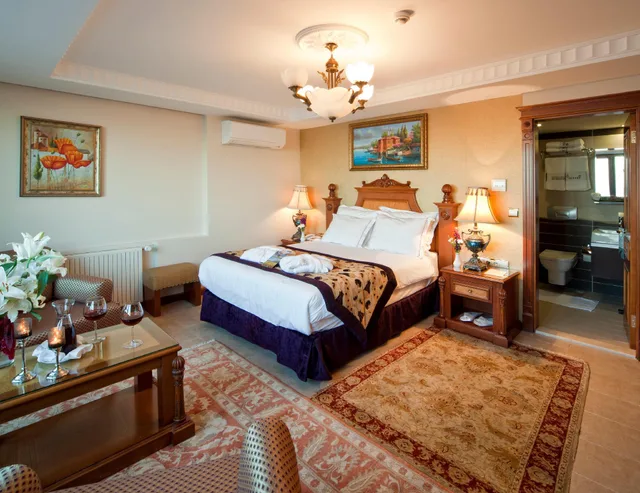 جناح تنفيذي بسرير كوين مع أريكة، Glk Premier Acropol Suites Spa Ex Best Western Premier Acropol Suite 1/3