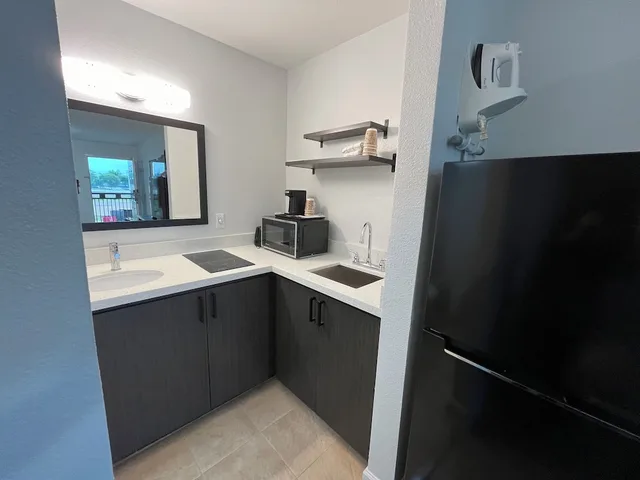 غرفة بسريرين مزدوجين بمطبخ للمدخنين، Studio6 Conroe, TX 5/5