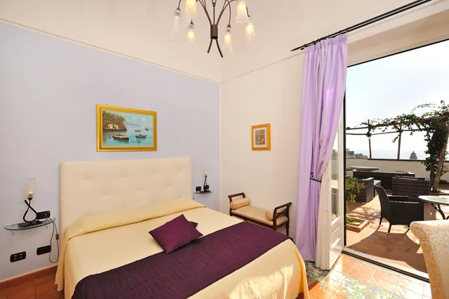 غرفة ديلوكس بسرير كوين بإطلالة على البحر، Hotel Villa Annalara 2/10