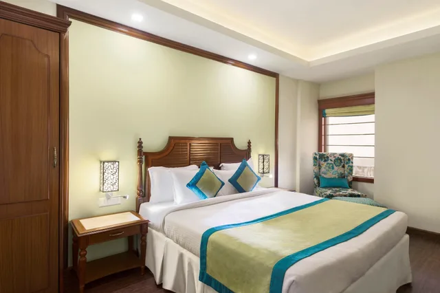 غرفة بسريرين منفصلين للمدخنين، Ramada by Wyndham Jamshedpur 1/5