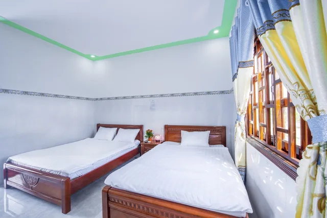غرفة أساسية بسريرين كوين بإطلالة على المسبح، Hotel Nguyen Toan 6/8