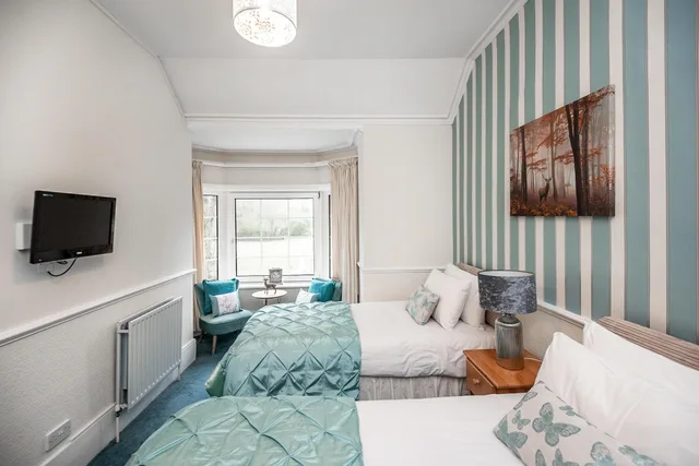 غرفة بسريرين منفصلين بإطلالة على الحديقة، Trivelles Waterhall Country Hotel 1/1