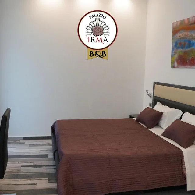 غرفة بسرير كينج بشرفة، B&B Palazzo Irma 4/9