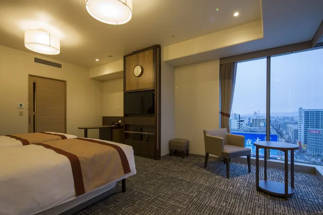 غرفة ديلوكس بسريرين منفصلين في طابق مرتفع في الطابق العلوي، Hotel Monterey Fukuoka 3/8
