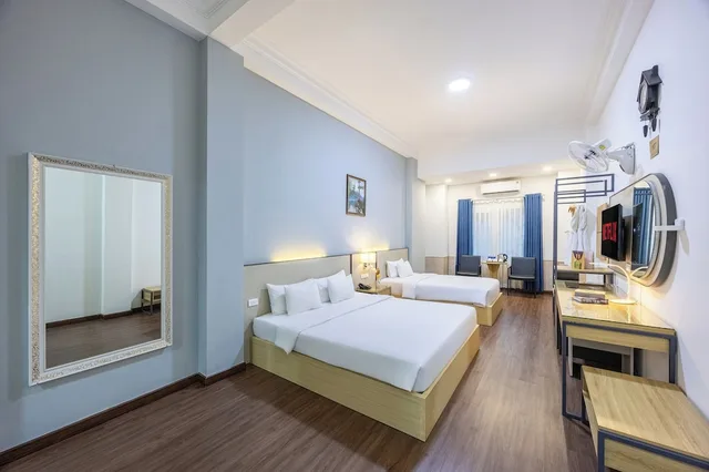 غرفة ديلوكس عائلية بسرير كوين وسرير فردي، A25 Hotel - 35 Mac Thi Buoi 4/10