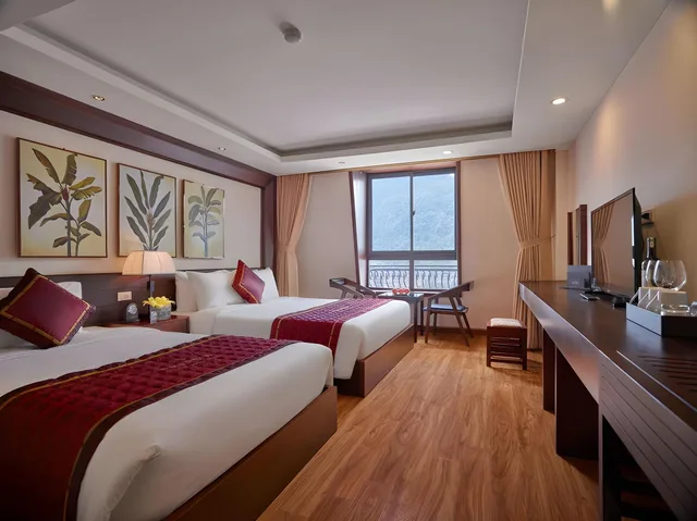 غرفة ديلوكس ثلاثية بسرير مزدوج، Freesia Hotel 1/1