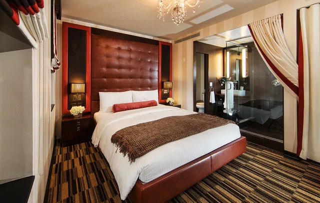 Suite, King Bed, Sofa, Living Area, Sanctuary Hotel New York 2/4