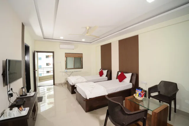 غرفة تنفيذية بسريرين منفصلين، Hotel Bramha Inn 2/4