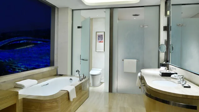 جناح بغرفة نوم واحدة مع دخول الصالة، CROWNE PLAZA DALIAN SPORTS CENTER 2/3