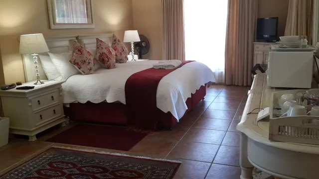 غرفة بسرير كينج، Riversong Guest House 3/5