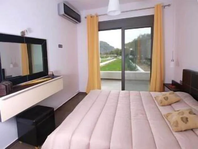 جناح بثلاثة أسرّة وسرير كوين بغرفتي نوم، Plakias Suites 7/10