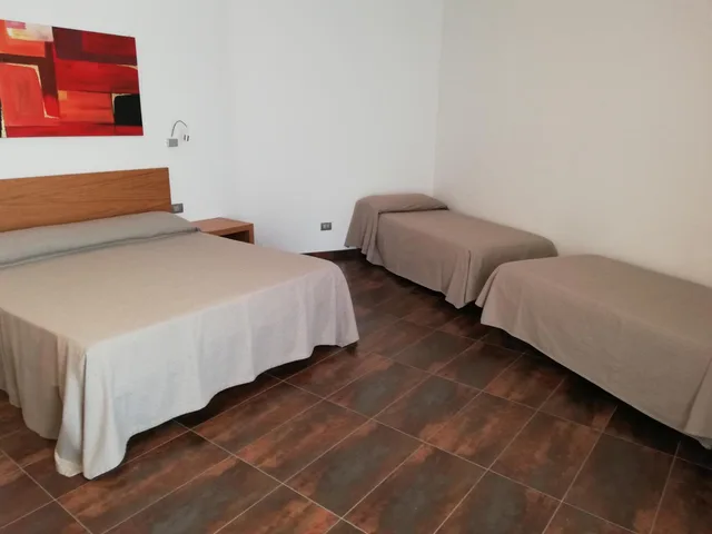 غرفة رباعية، Sciali Hotel 1/5