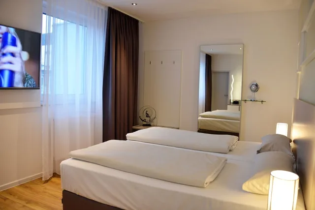 غرفة بسريرين منفصلين في الملحق، Arthotel Munich 4/7