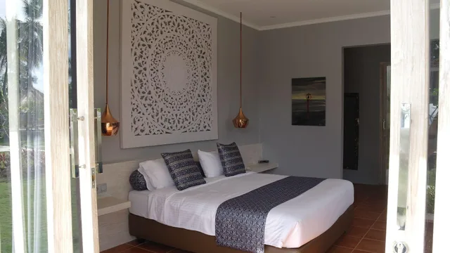 جناح بسرير كينج بإطلالة على الحديقة بشرفة، The Suites Lombok 1/2
