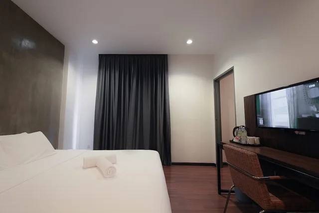 غرفة ديلوكس بسرير مزدوج وسريرين منفصلين، T+ Hotel Sungai Korok 3/7