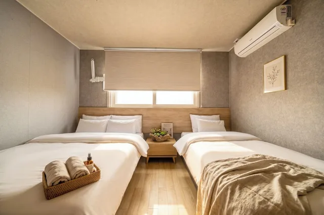 غرفة عائلية بسرير مزدوج وسرير فردي بإطلالة على المدينة، Malu Hotel 4/10