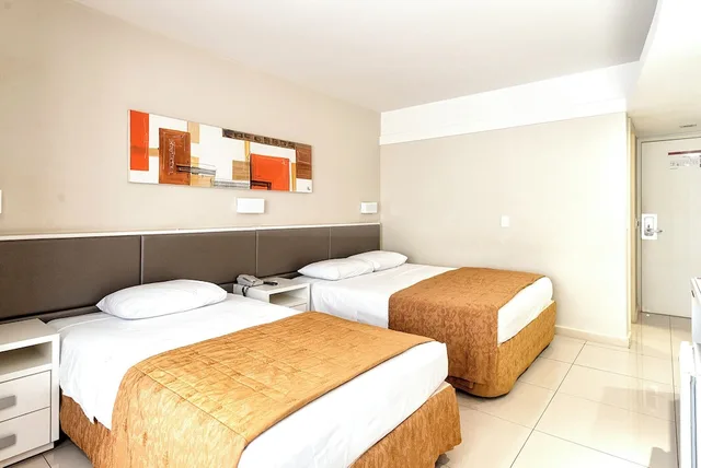 غرفة ديلوكس ثلاثية بسرير مزدوج وسرير فردي، Rafain Palace Hotel and Convention Center 1/1