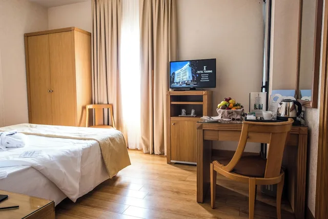 غرفة عائلية بسرير كوين وسرير فردي، Hotel Touring Carpi 1/4