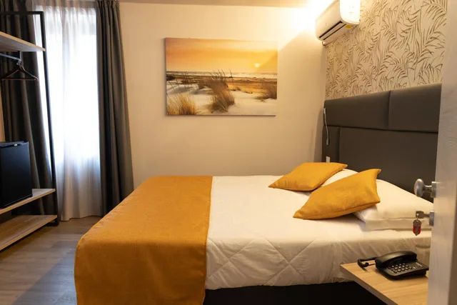 غرفة قياسية بسرير مزدوج أو سريرين منفصلين، Bike Hotel Touring Gardone Riviera Wellness 1/1