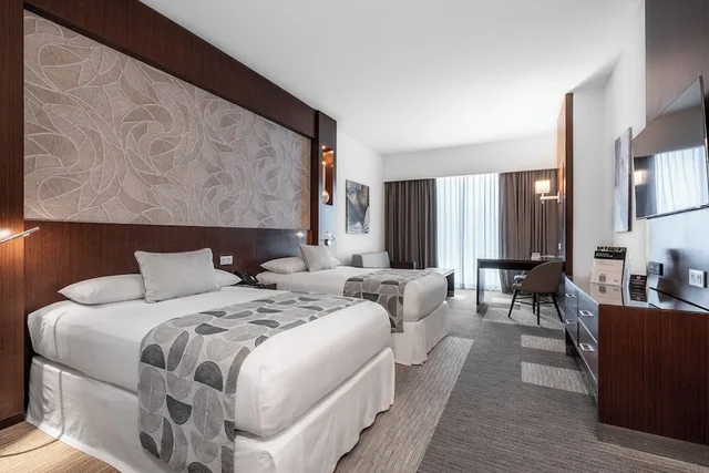 غرفة ديلوكس عائلية بسريرين منفصلين مع أريكة، Riu Plaza Panama 4/10