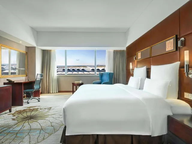 جناح ديلوكس بسرير كينج وسرير كوين بإطلالة، Pullman Guangzhou Baiyun Airport Hotel 1/2