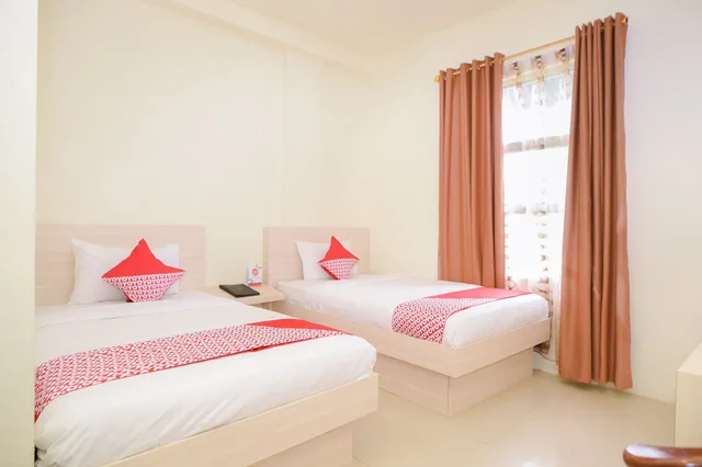 غرفة ديلوكس بسريرين منفصلين، Hotel Capital O 854 Ub Caisar Hotel 2/4