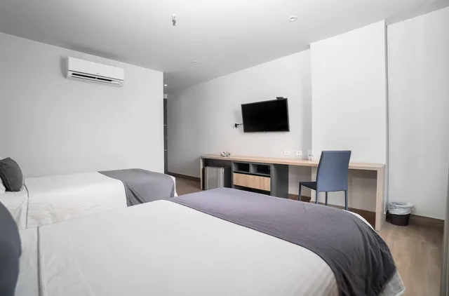 غرفة قياسية بسريرين منفصلين، Hotel Plaza del Lili 2/4