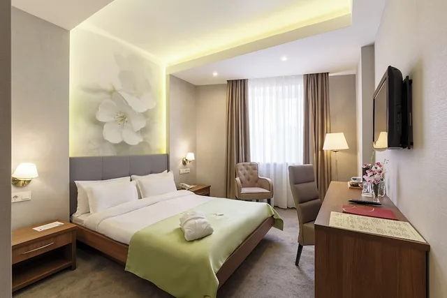 غرفة قياسية بسرير كوين، Renion Hills Hotel 1/2