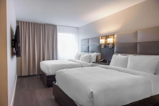 Efficiency, Suite, Multiple Beds، Les Suites Victoria Ascend Hotel Collection 1/4