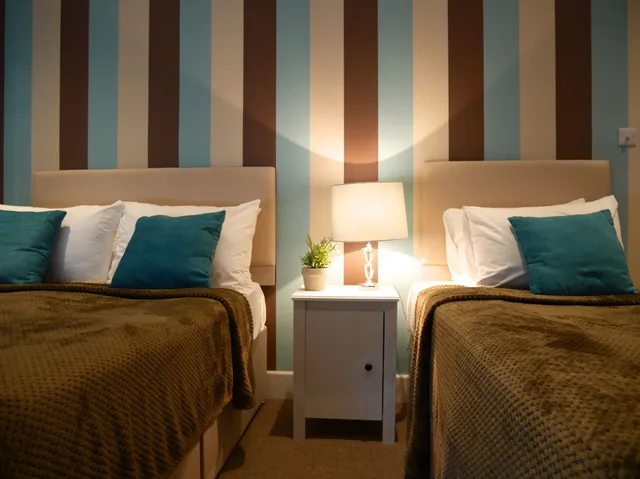 غرفة رباعية بسرير مزدوج وسريرين منفصلين، RAVNA GORA HOTEL 3/4