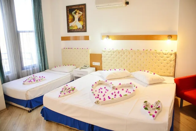 غرفة قياسية ثلاثية بسرير مزدوج وسرير فردي، Miranda Moral Beach Hotel 3/10