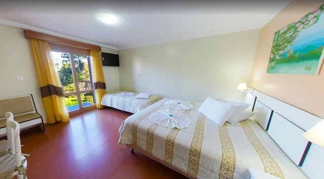غرفة ديلوكس ثلاثية بسرير مزدوج وسرير فردي، Zermatt Hotel 3/8
